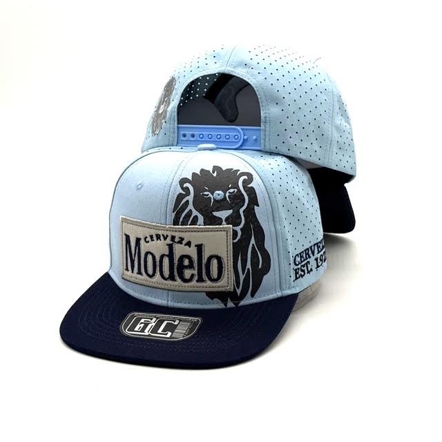 Modelo Cerveza lion snapback in light blue and navy